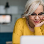 Woman looking at computer